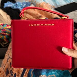 Brandon Blackwood Red medium trunk Bag